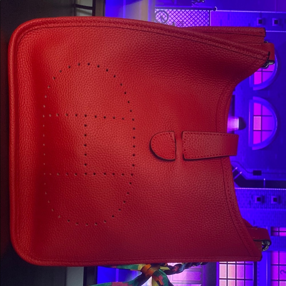 Vibrant Red Leather Crossbody Bag with Perforated Design